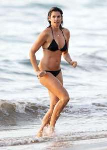 RUN, CINDY, RUN! CINDY CRAWFORD still a bikini babe well into her 40s